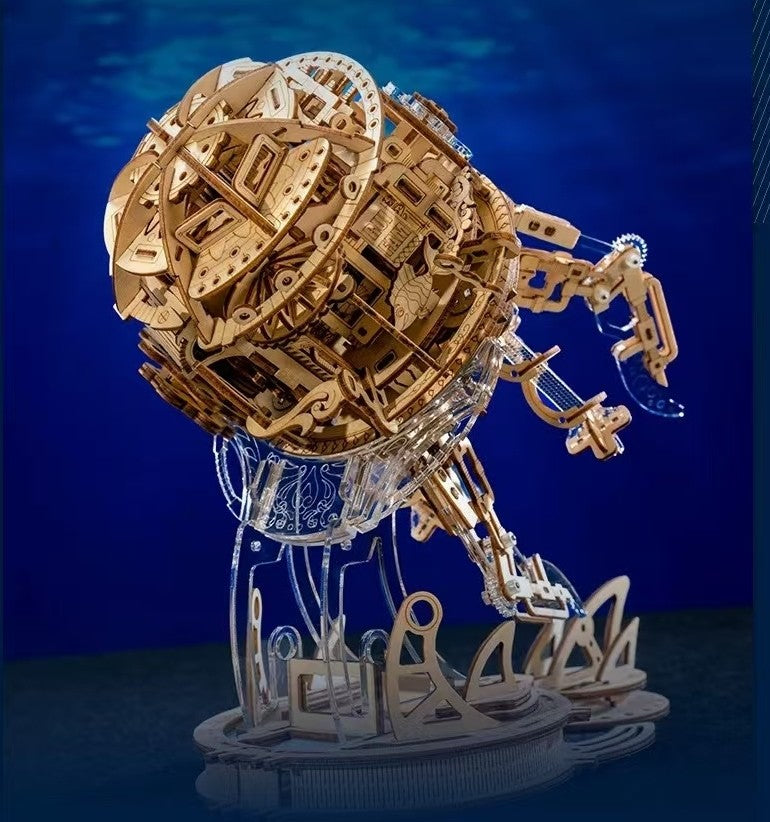 an assembled Jellyfish 3D Wooden Mechanical Gear Puzzle in a blue ocean themed table setting