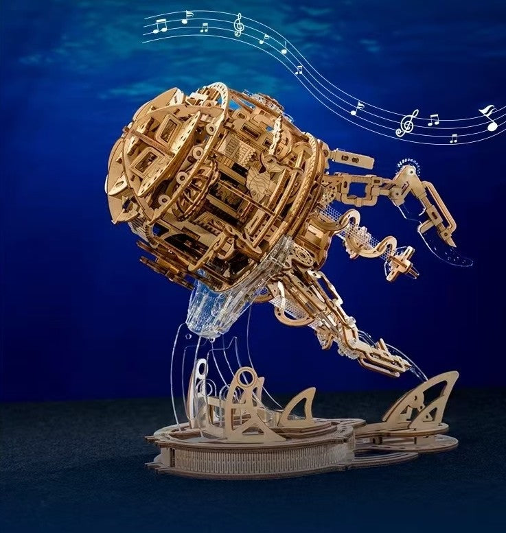 an assembled Jellyfish 3D Wooden Mechanical Gear Puzzle in a blue ocean themed table setting