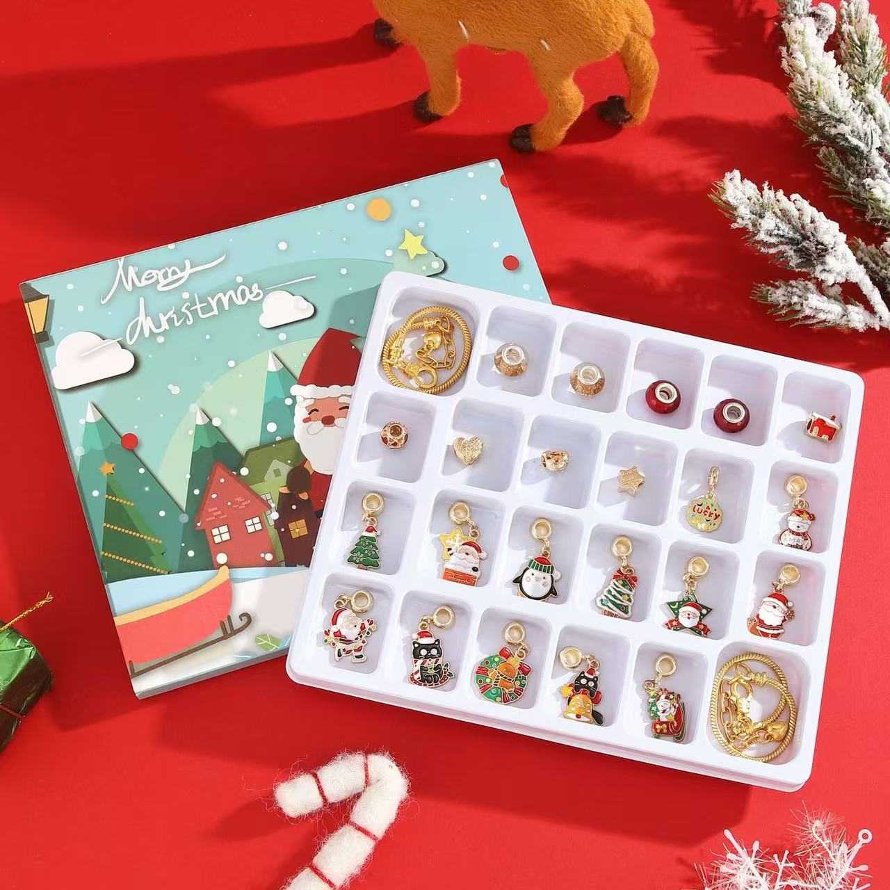 image displaying all the 22 charms and 2 bracelet of Lucky Santa Advent Calendar DIY Bracelet Set 24 Days Christmas Countdown in the package box