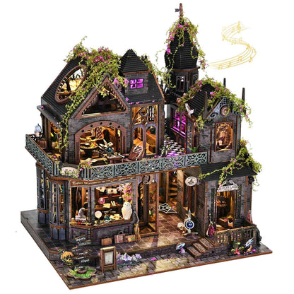 Detailed miniature house model of a gothic-style dollhouse with intricate design and decorative elements.