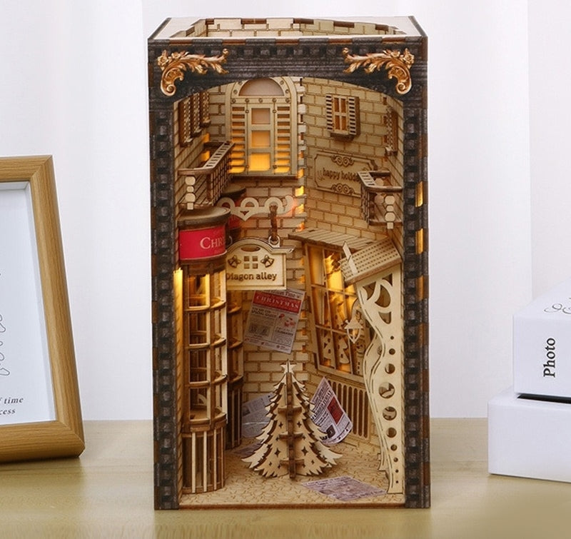 Magic Diagon Alley DIY Book Nook Kit of Christmas Version, A charming bookshelf insert decor miniature 3d wooden puzzles inspired by Harry Potter, perfect for holiday gifting, crafting enthusiasts and dollhouse collectors alike.