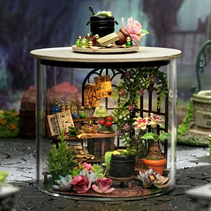 image displaying a assembled Magic Garden DIY Miniature House Kit in Dream Bottle Series in botanic-themed table setting