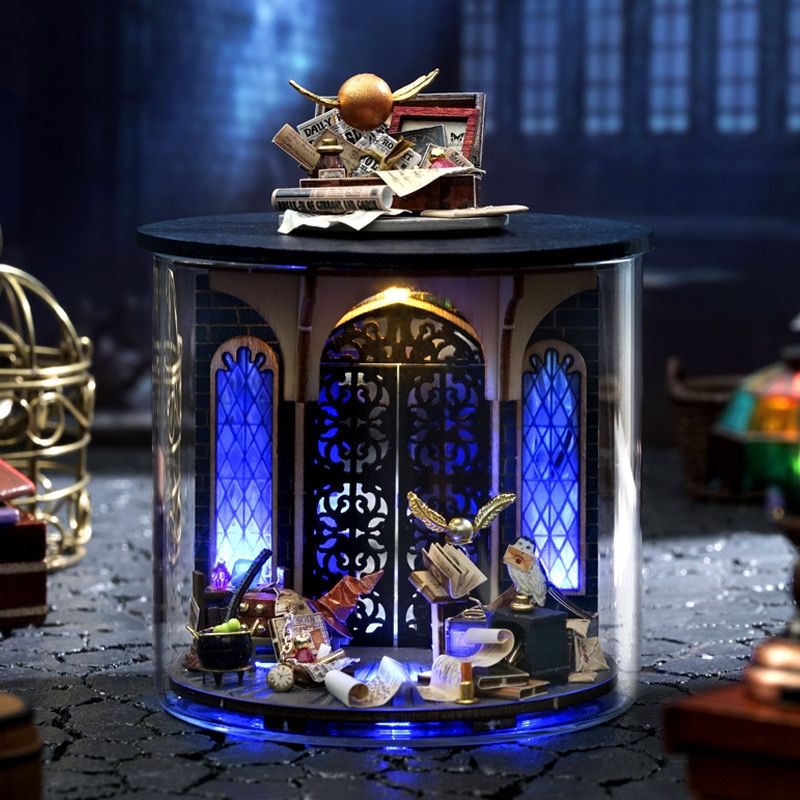 image displaying the assembled Magic Gate DIY Miniature House Kit in Dream Bottle Series in a magic-themed table setting