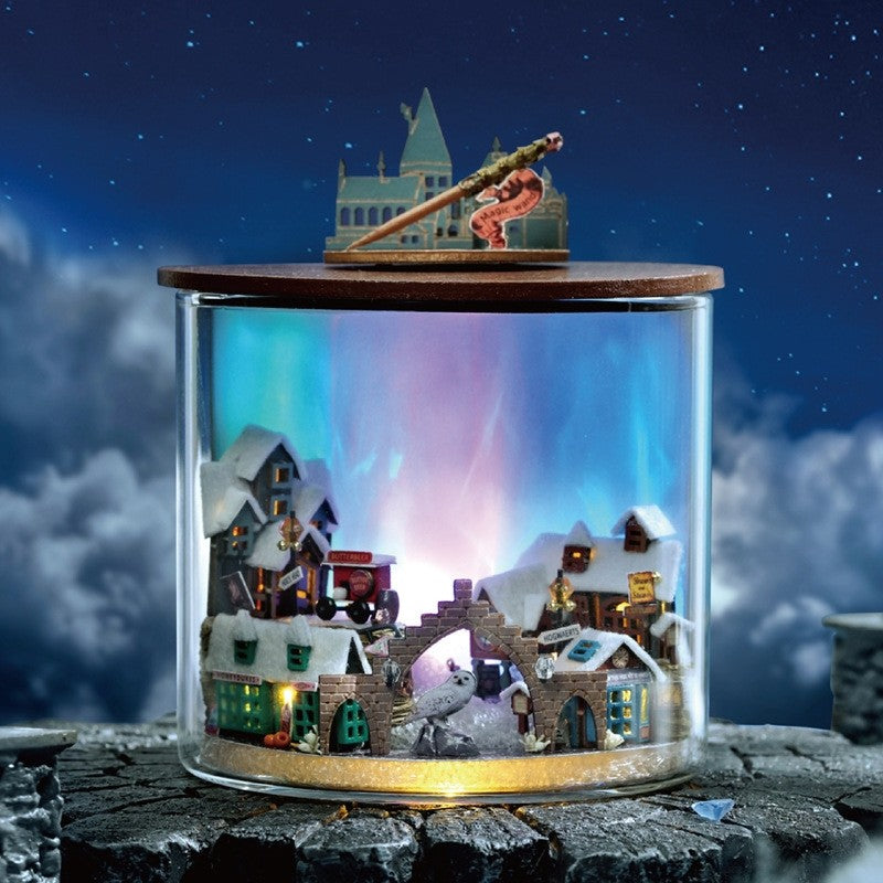 image displaying a finished Magic Light DIY Miniature House Kit with Aurora Lighting effect in a night sky setting