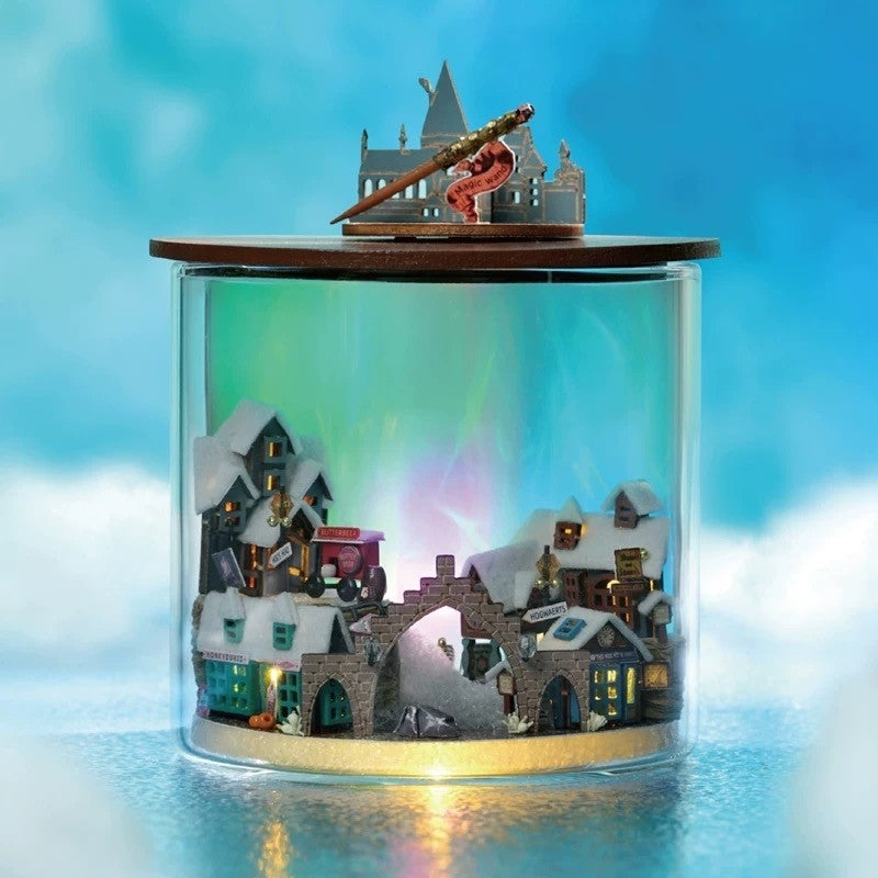 image displaying a finished Magic Light DIY Miniature House Kit with Aurora Lighting effect