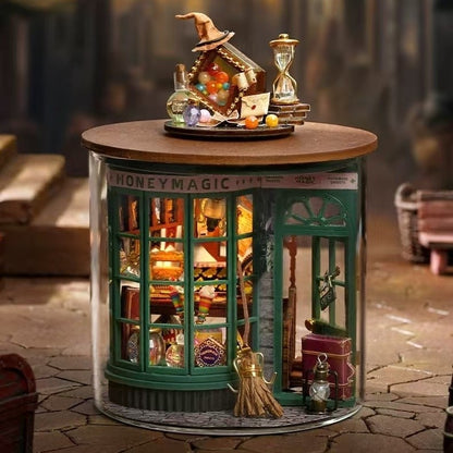 image displaying an assembled Magic Shop DIY Miniature House Kit in Dream Bottle Series in magic-themed table setting