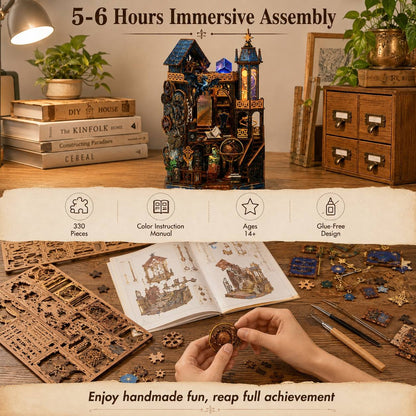 A Celestial-style wooden model kit shown assembled on a wooden table, with hands holding a small wooden piece in the foreground. The scene includes books, plants, drawers, tools, and an instruction booklet, plus overlaid marketing text reading '5-6 Hours Immersive Assembly' and 'Enjoy handmade fun, reap full achievement.