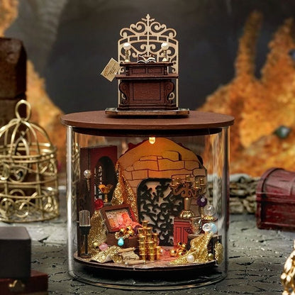 image displaying the assembled  Magic Treasure DIY Miniature House kit in Dream Bottle Series in a magic-themed table setting