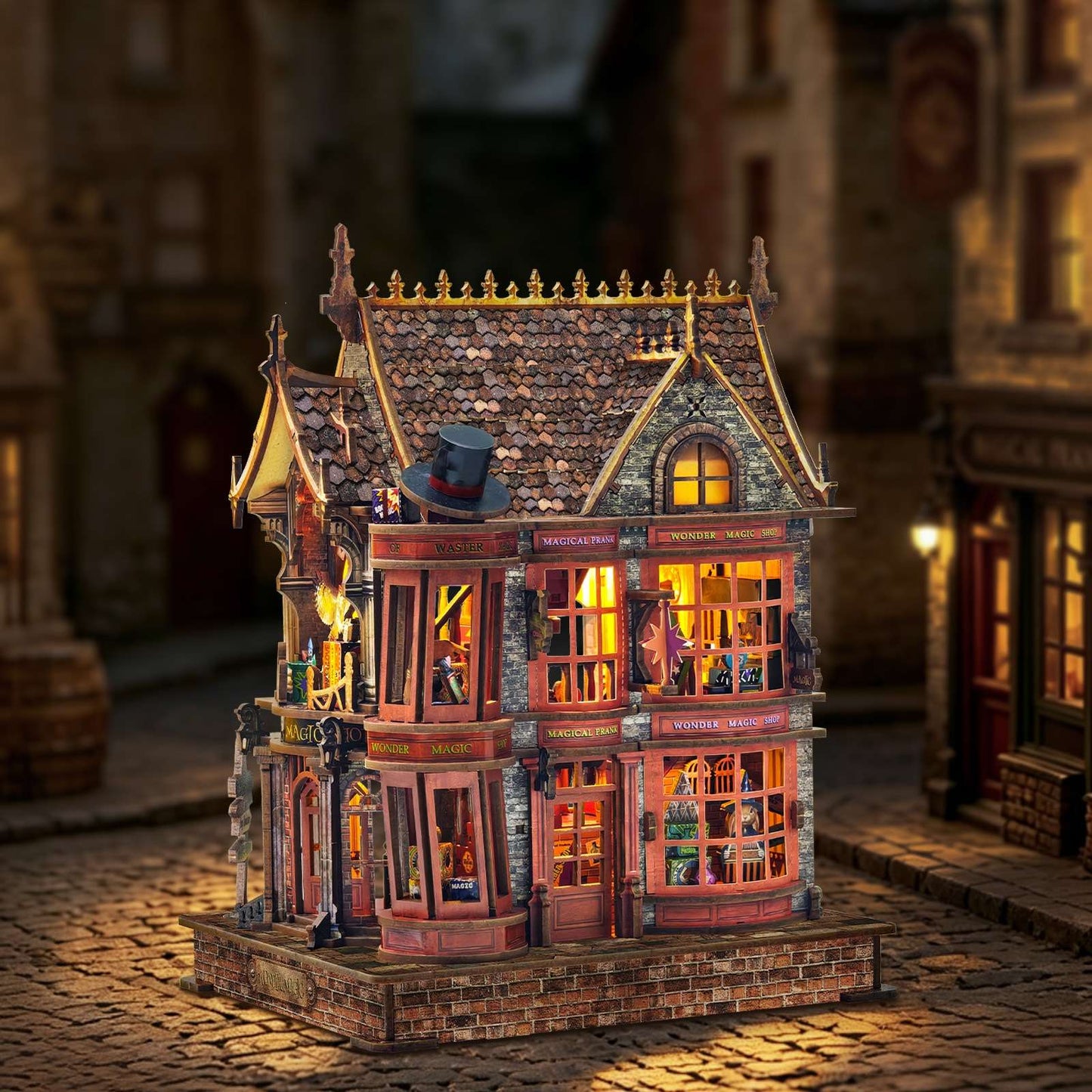 Detailed miniature house model of a vintage shop with illuminated windows on a cobblestone street.