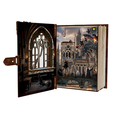 Open book nook with a detailed miniature of a cathedral scene on a white background