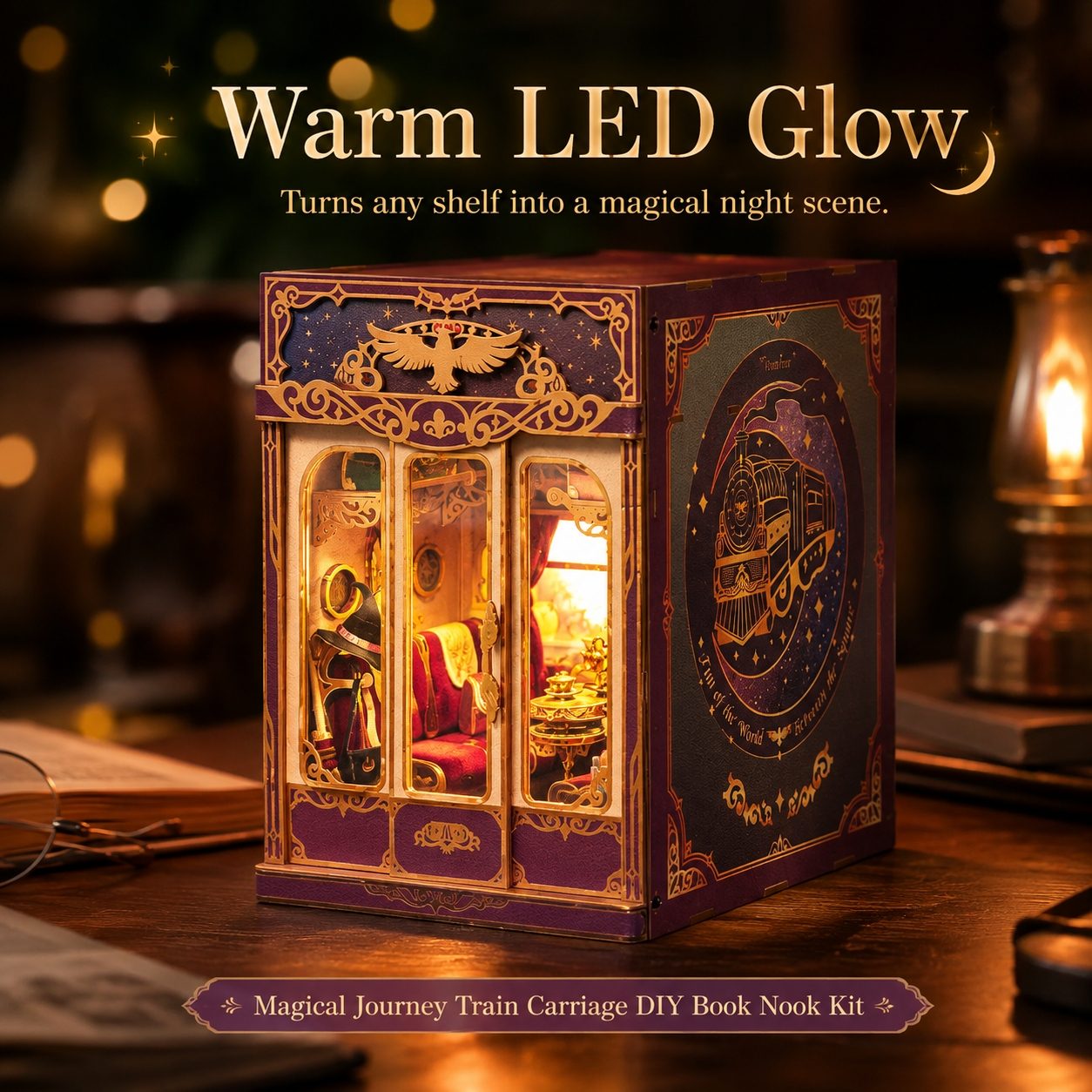 A train carriage book nook kit displayed on a wooden shelf, glowing with warm LED lights. The product features a purple and gold box design with ornate detailing, a miniature interior scene, and text overlays highlighting its warm LED glow feature.