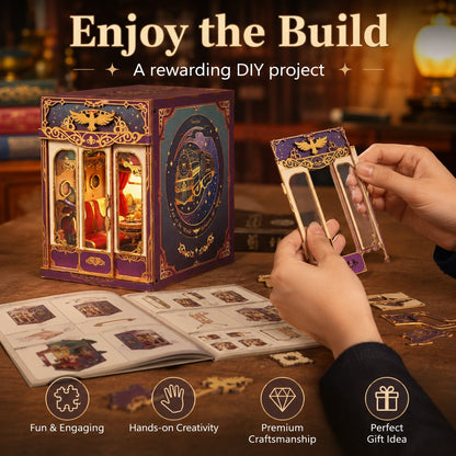 DIY wooden miniature building kit shown with an assembled decorative box, a person holding a wooden panel, and instruction cards on a wooden table. Text at the top reads 'Enjoy the Build' and icons at the bottom highlight fun, hands-on creativity, premium craftsmanship, and gift value.