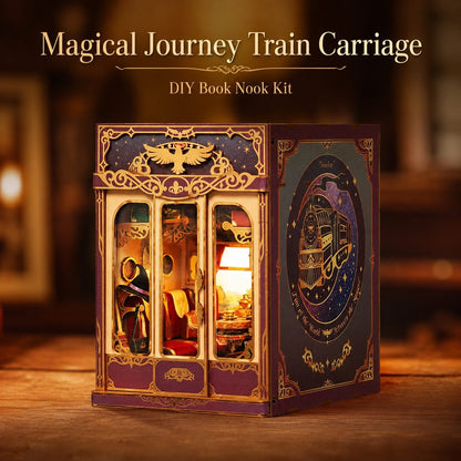 A train-themed DIY book nook kit displayed on a wooden surface. The product is a small ornate box with purple and gold detailing, featuring a train illustration on the side panel and illuminated interior scenes visible through the front windows.