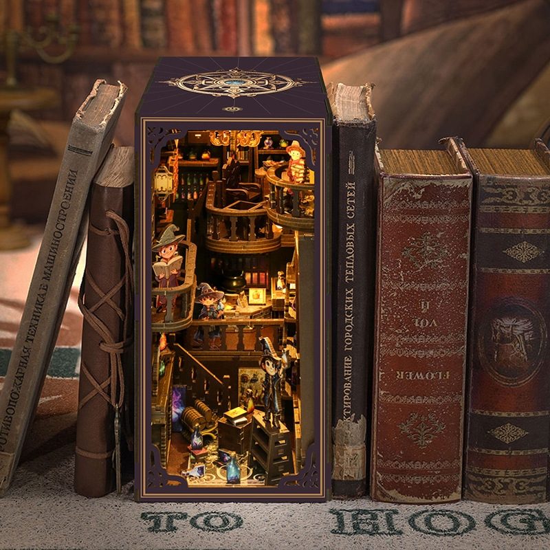 image displaying Master Alchemist Book Nook between books as a bookshelf insert decorattion
