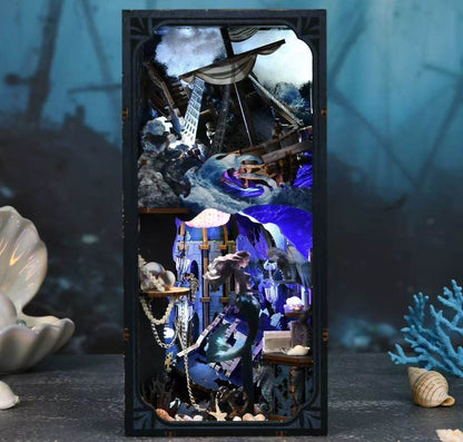 Mermaid-themed Book Nook case with a nautical theme featuring a ship, waves, and seashells.