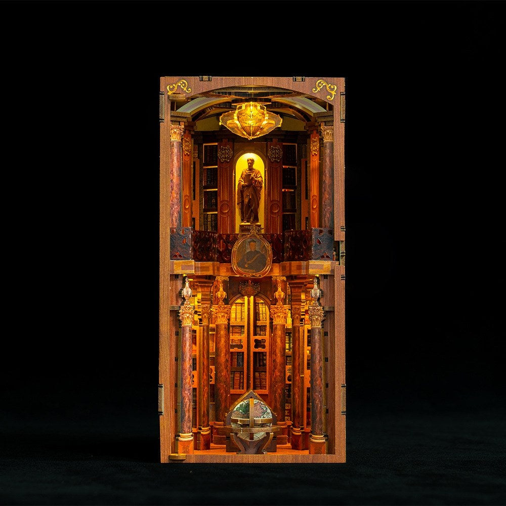 image displaying front side of Monastery Library Book nook with light in black background 