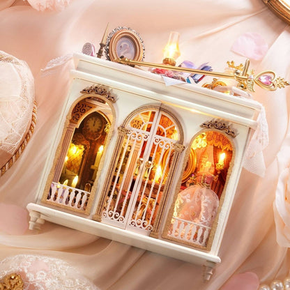 Decorative miniature scene with intricate details on a soft pink background