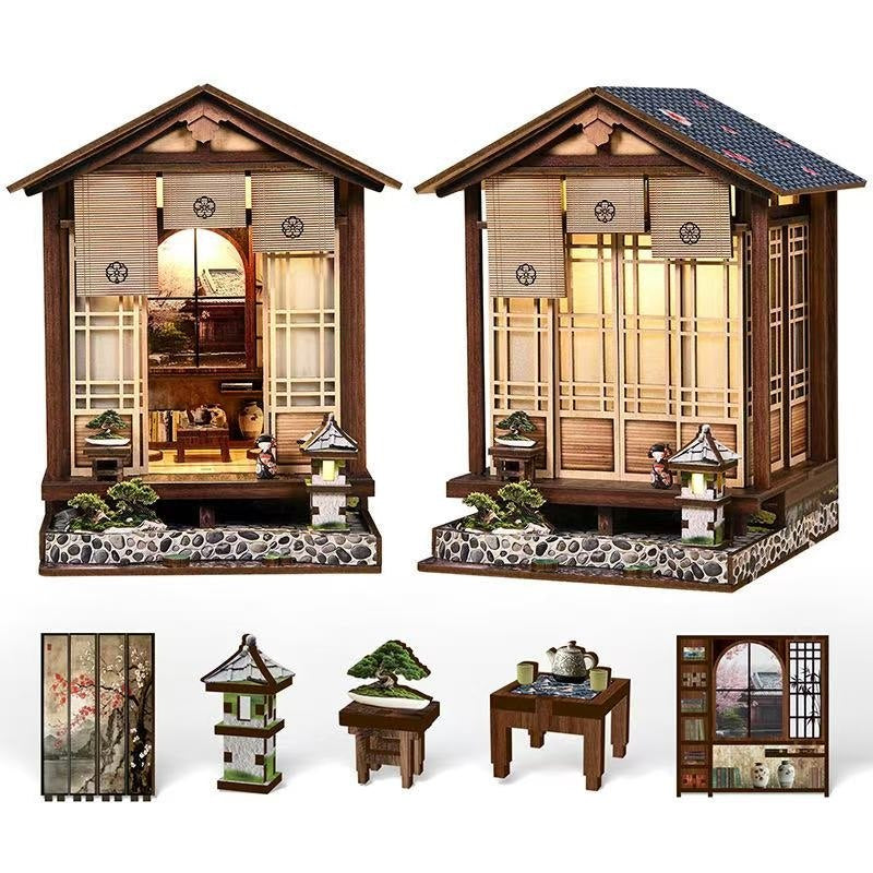 Set of miniature Japanese-style buildings with detailed interior and furniture on a white background.