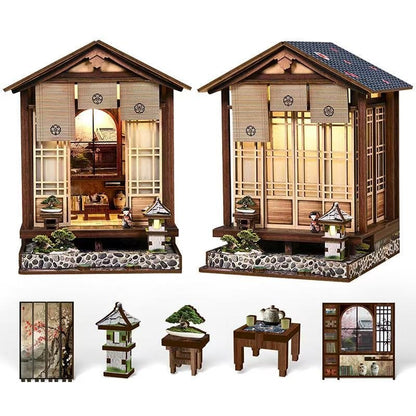 Set of miniature Japanese-style buildings with detailed interior and furniture on a white background.