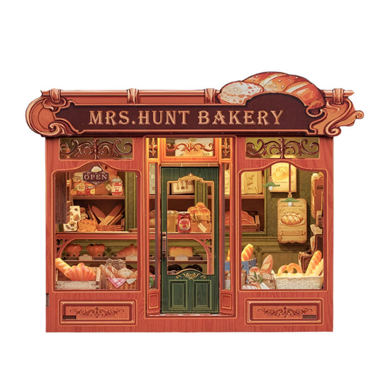 Mrs. Hunt’s Bakery Shop DIY Dollhouse Kit, a miniature house featuring fresh breads, warm lights, eco-friendly wood, and a snap-fit design for easy assembly.