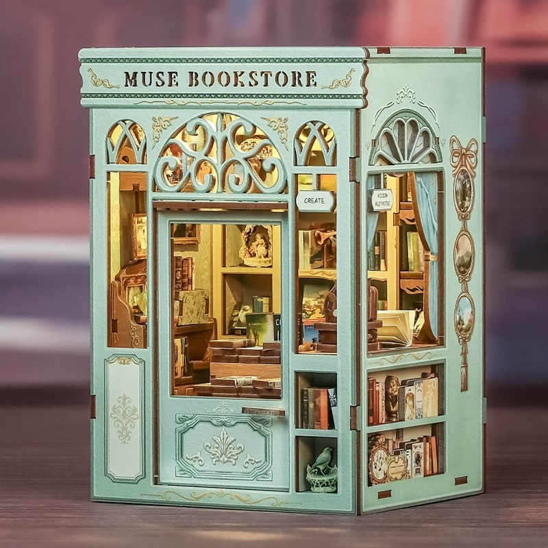image displaying the right 45 degree view of Muse Bookstore DIY Book Nook Kit on table