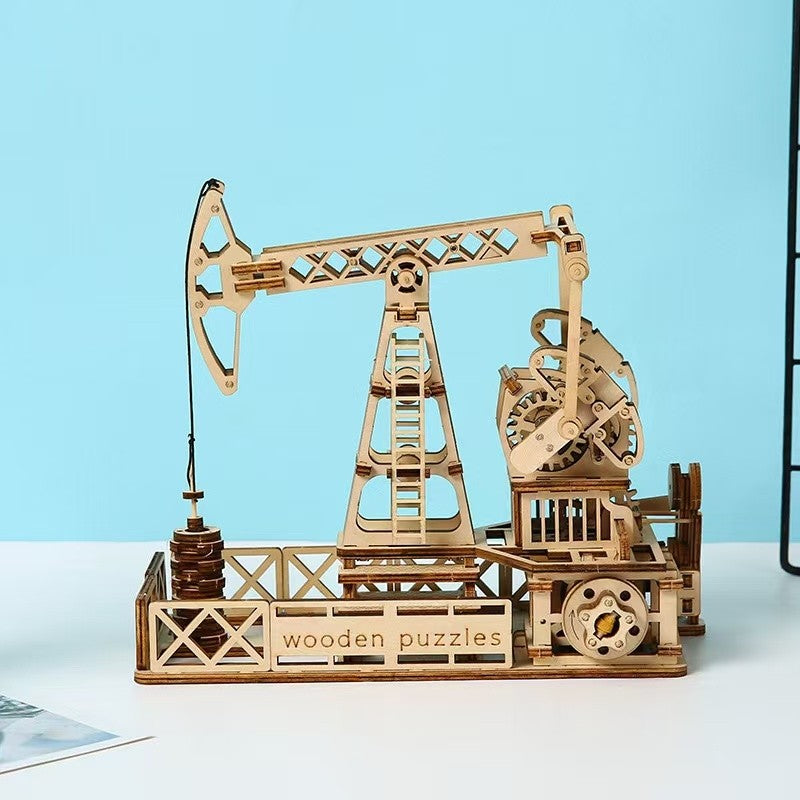 image displayed different side views of the finished Oil Derrick 3D Wooden Puzzle on table