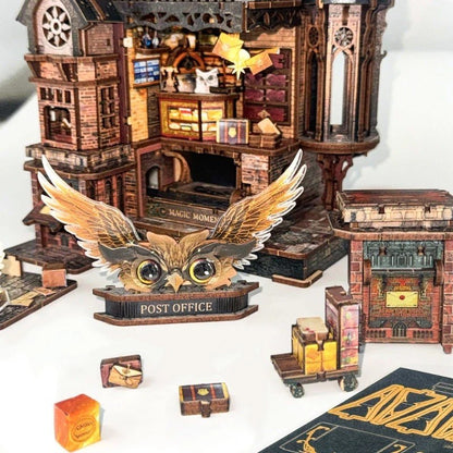 Wooden miniature set with an owl figure labeled 'Post Office' and miniature buildings.