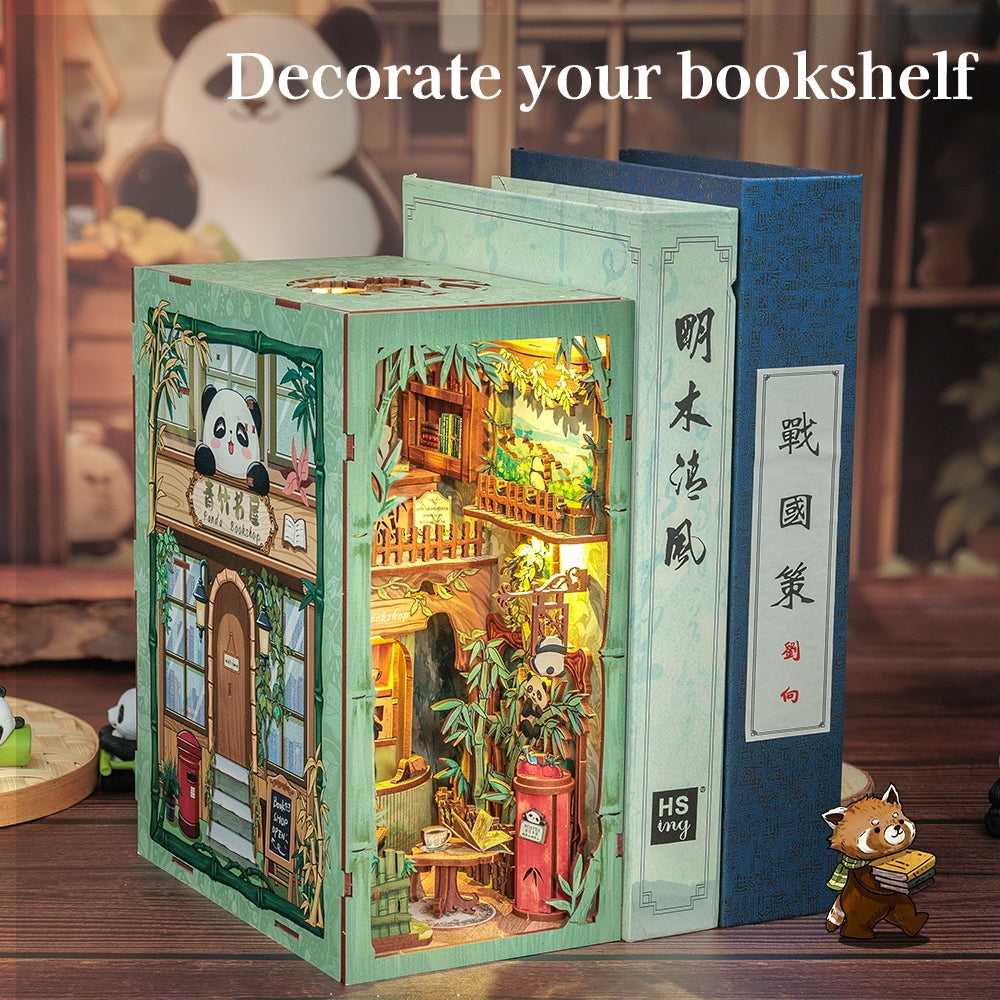 a finished Panda Book Shop DIY book nook kit insert between books to decor the bookshelf