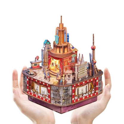 image displaying the assembled Paramount Ballroom DIY Music Box 3D Puzzle Kit holding with hands