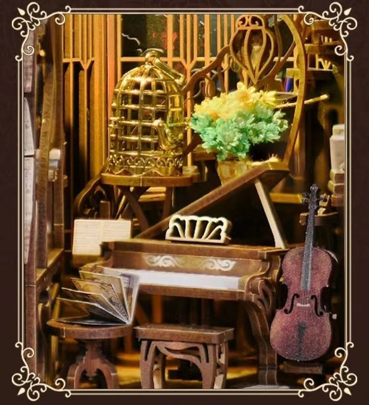 Pianist With Nightingale DIY Book Nook kit inspired by the captivating era of the Art Nouveau movement. perfect for DIY crafting enthusiasts and dollhouse collectors alike. Ideal for bookshelf decor of gift for music or history overs. tiny nightingale in birdcage