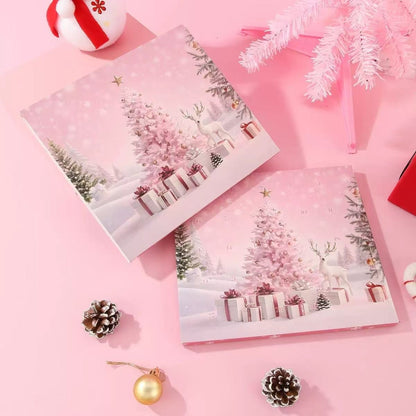 Two Christmas-themed packing box on a pink background with festive decorations.