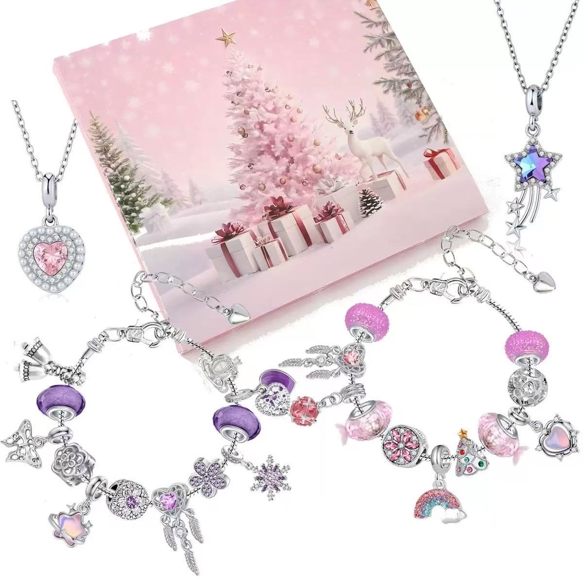 Jewelry set with charms including a necklace and bracelet on a pink gift box background.