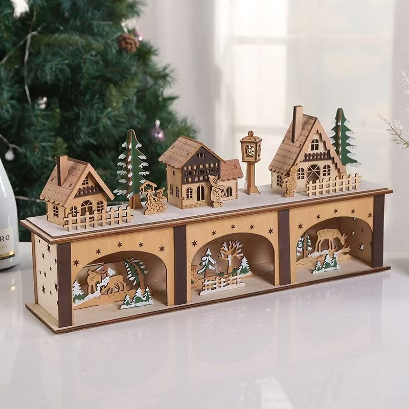 image displaying the Pre-lit Wooden Christmas Village Town House Tabletop Decoration in a Christmas table setting