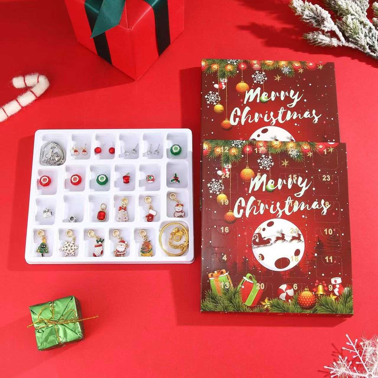 image displaying inside package of Red Christmas Advent Calendar DIY Jewelry Set 24 days countdown, including the charms, earrings, and bracelets