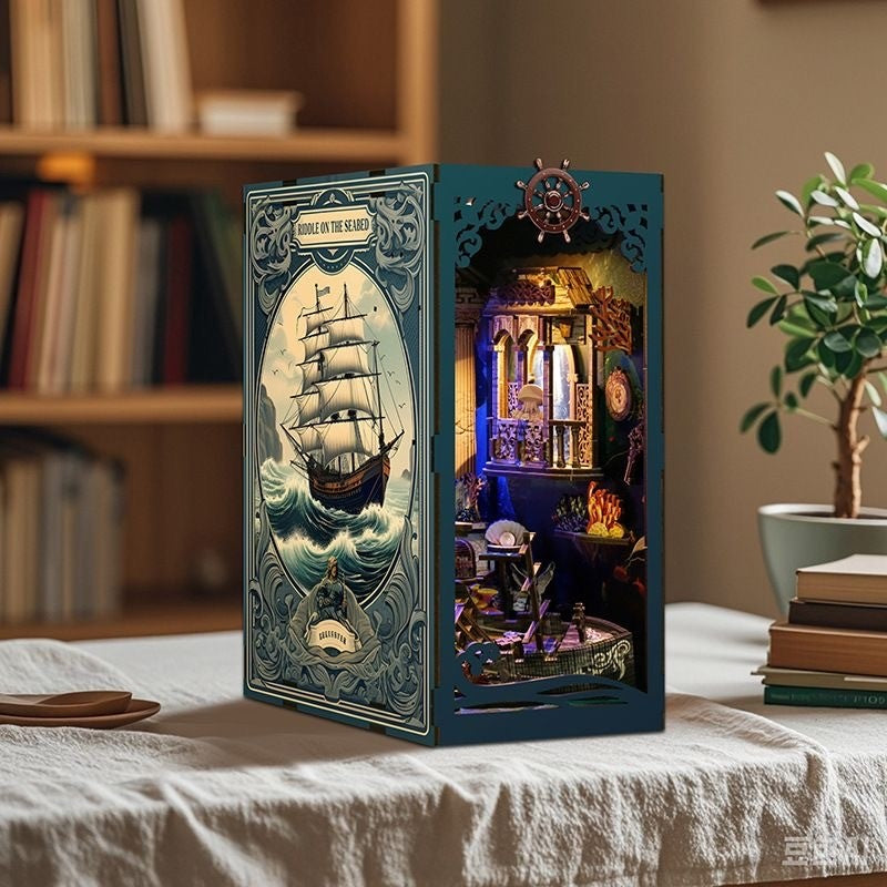 image displaying finished Riddle on the Seabed DIY Book Nook Kit on table