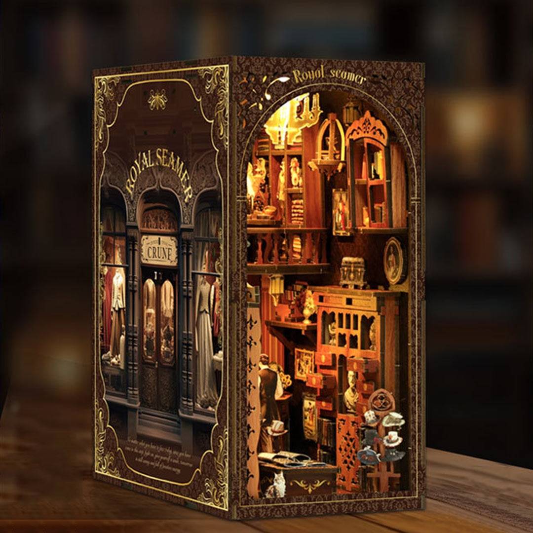 image displaying assembled Royal Tailor Shop DIY Book Nook Kit on table