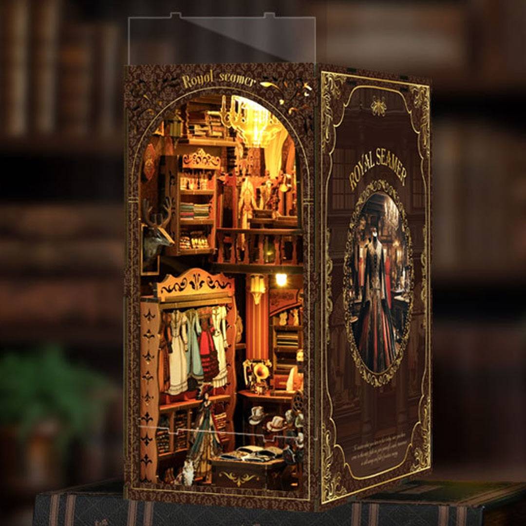 image displaying a piece of dust cover slotting in a assembled Royal Tailor Shop DIY Book Nook Kit