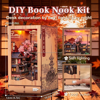 DIY Book Nook Kit with cherry blossom design, soft lighting, and touch switch on a wooden background.