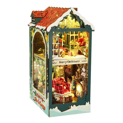 image displaying left side the assembled Santa's Christmas House DIY Book Nook Kit in white background