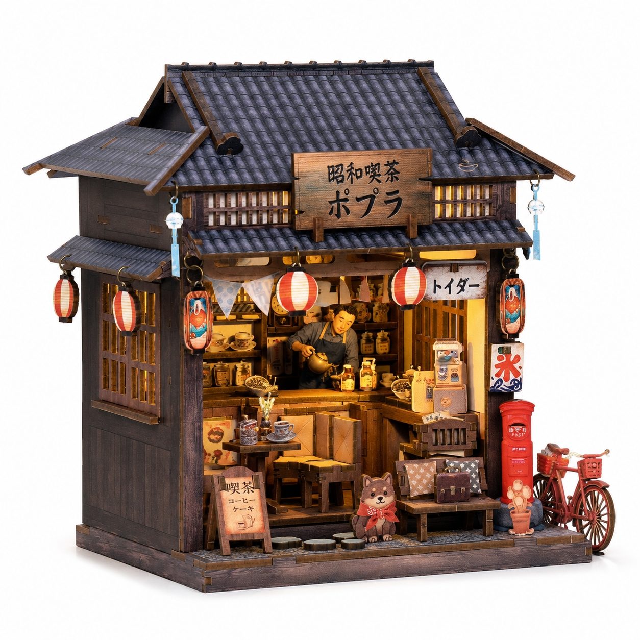 A miniature Japanese-style tea shop diorama with a dark wooden facade, tiled roof, hanging red lanterns, a visible shop interior with tiny figures and shelves, a red post box, and a small bicycle on the right, all shown on a plain white background.
