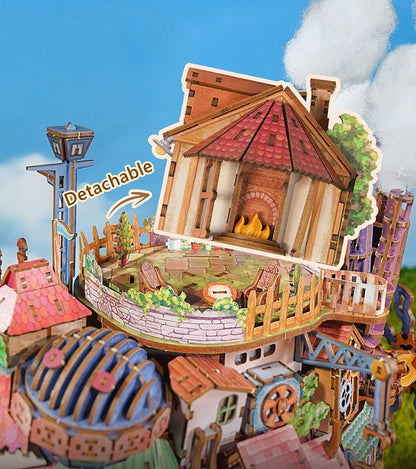 Detailed model of a Skybound village with detachable parts against a blue sky.