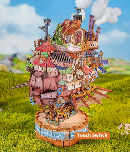 Colorful miniature model of a steampunk-style house on grass with 'Touch Switch' branding.
