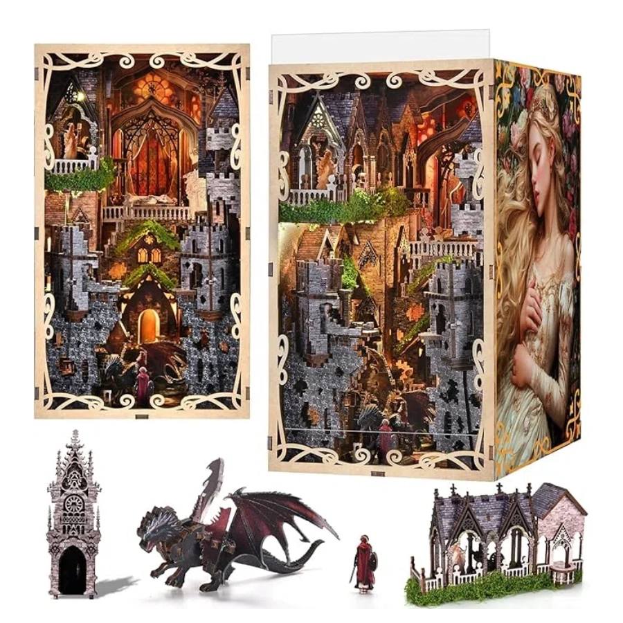 Gothic-style miniature diorama set with detailed buildings, a dragon, and figures in a wooden book nook