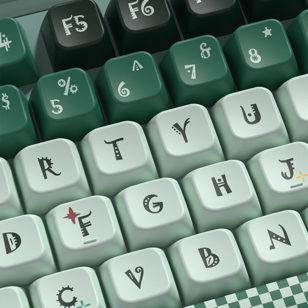 Close-up of a keyboard with green and gray keys Inspired by Slytherin in Harry Potter