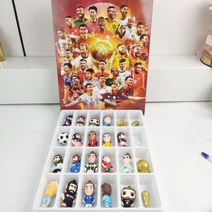 Collection of soccer player figurines in a soccer players advent calendar box