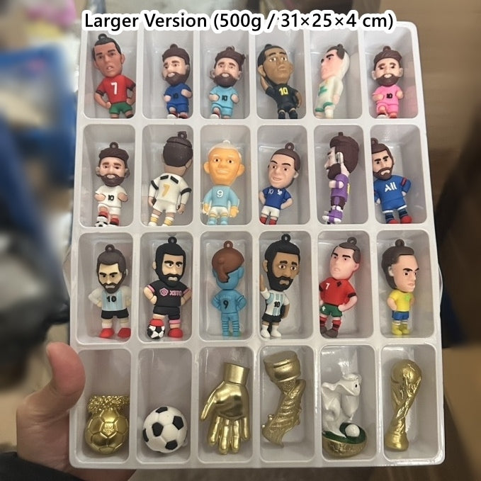 Collection of small figurines and soccer-themed items in a advent calendar box tray