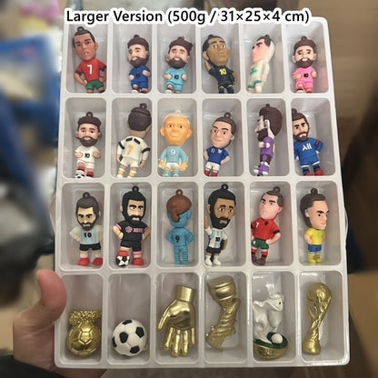 Collection of small figurines and soccer-themed items in a advent calendar box tray