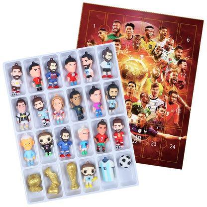 Collection of soccer-themed figurines in a advent calendar box in the background.