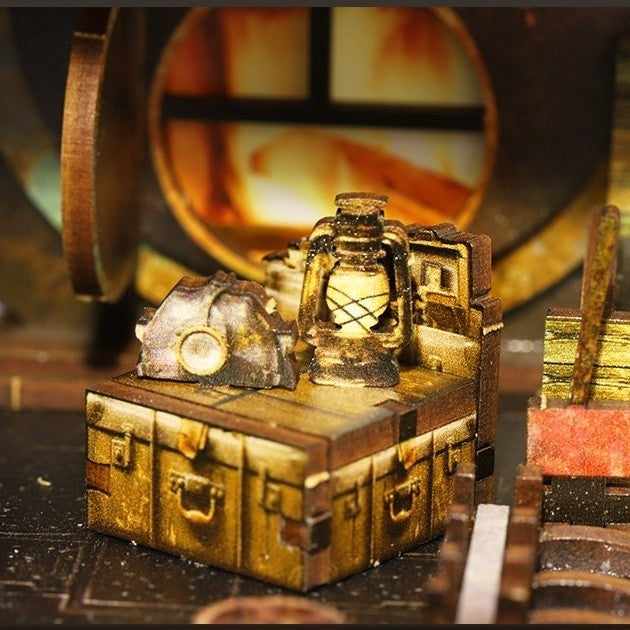 image displaying the lit vintage oil lamp in Steampunk World DIY Book Nook Kit