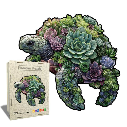 Wooden puzzle shaped like a turtle with succulent design on a white background